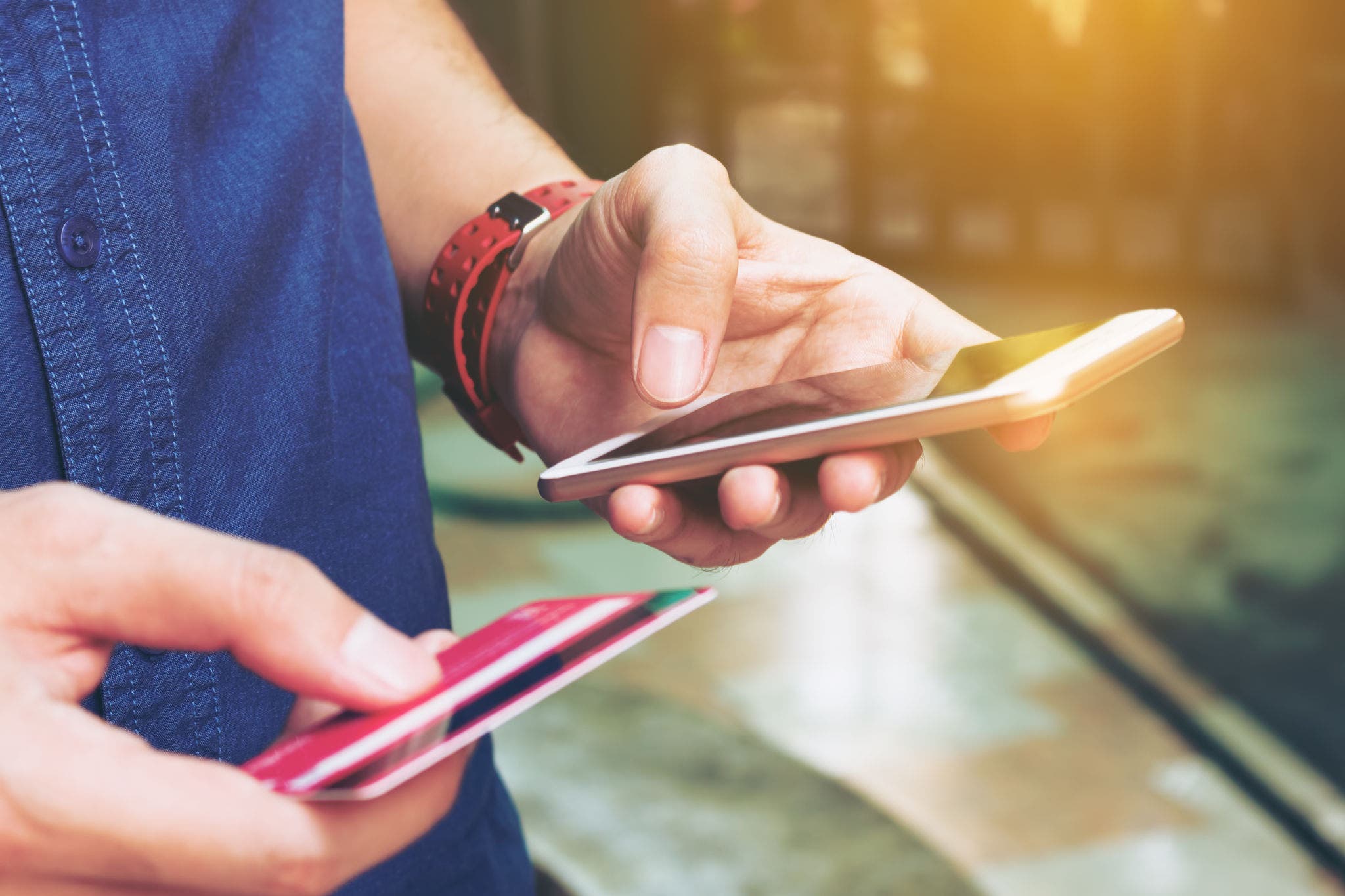 Man use smart phone and holding credit card with shopping online. Online payment concept.
