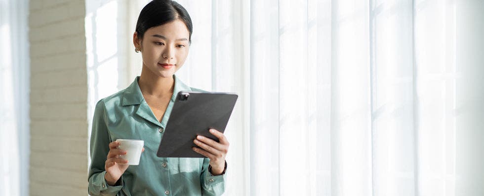 Header image of woman navigating on phone